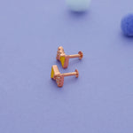 side angle of silver kid stud with south screw
