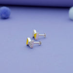 side angle of silver kid stud with south screw